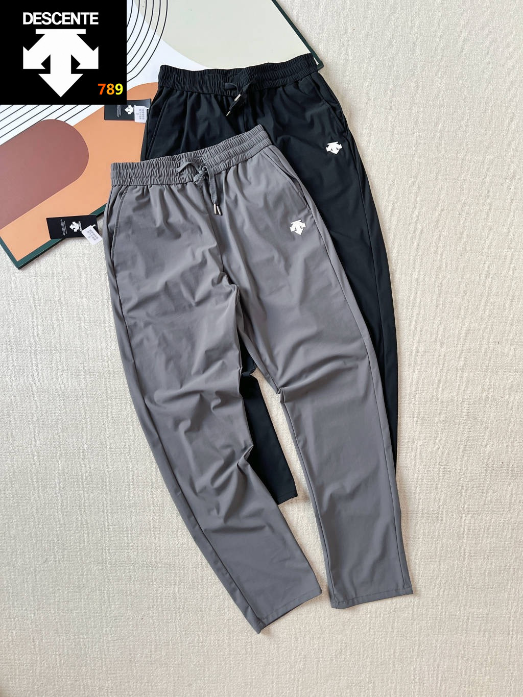 Descente Solid-Color Logo Elastic Waist Athletic Pants -- Unisex view 1