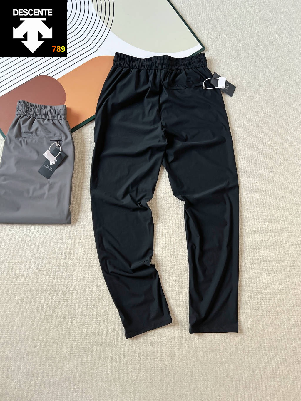 Descente Solid-Color Logo Elastic Waist Athletic Pants -- Unisex view 6