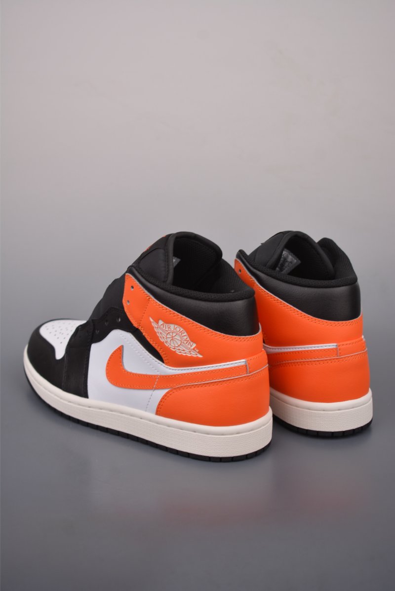 Air Jordan 1 Mid 'Black / White / Orange' view