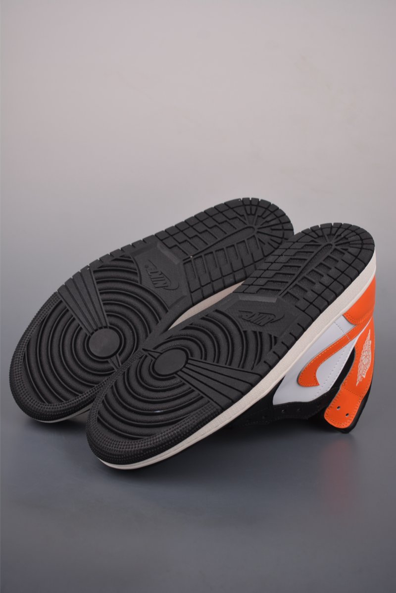 Air Jordan 1 Mid 'Black / White / Orange' view
