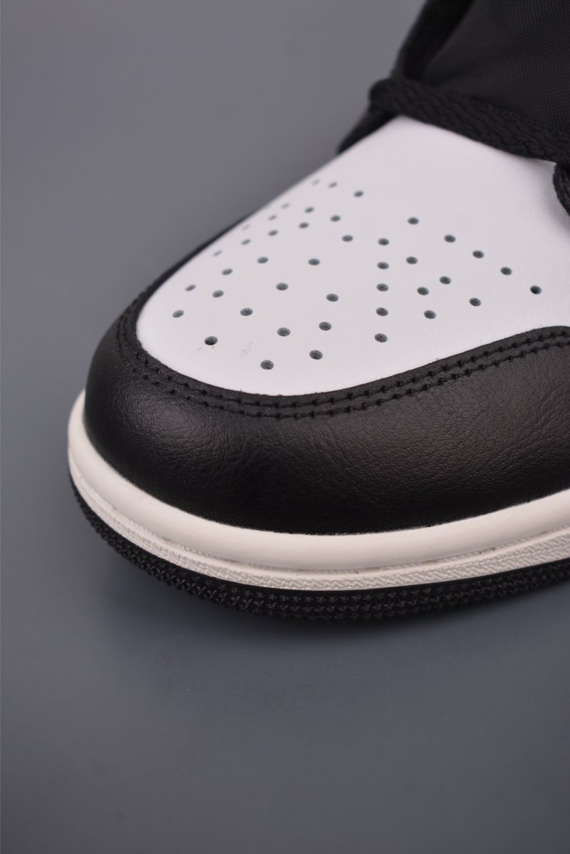 Air Jordan 1 Mid 'Black / White / Orange' view