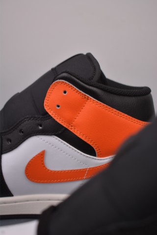 Air Jordan 1 Mid 'Black / White / Orange' view 8
