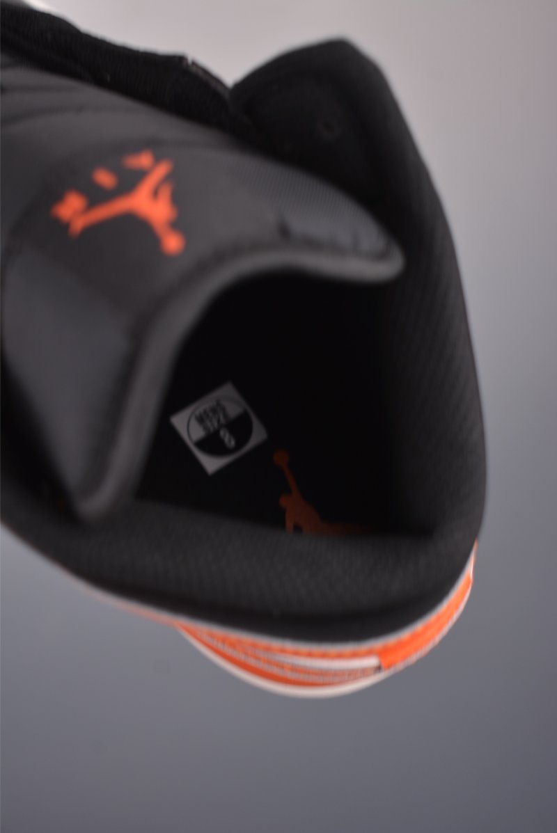 Air Jordan 1 Mid 'Black / White / Orange' view