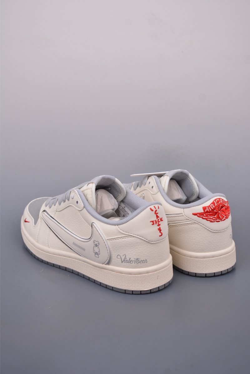 Fragment x Travis Scott x Air Jordan 1 Low 'Black / White / Blue' view