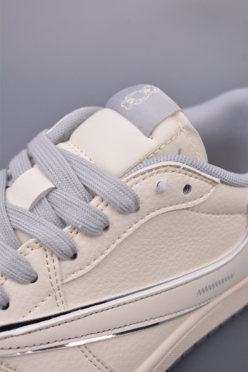 Fragment x Travis Scott x Air Jordan 1 Low 'Black / White / Blue' view