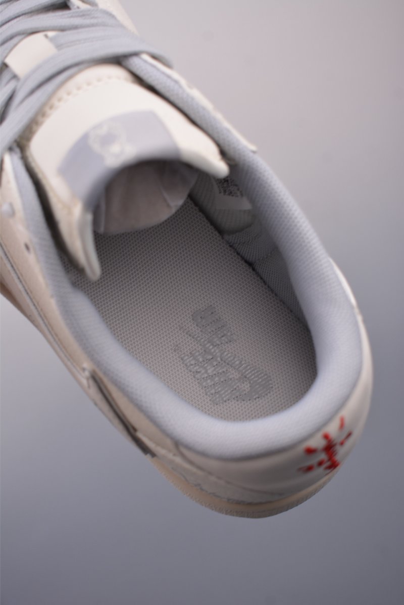 Fragment x Travis Scott x Air Jordan 1 Low 'Black / White / Blue' view