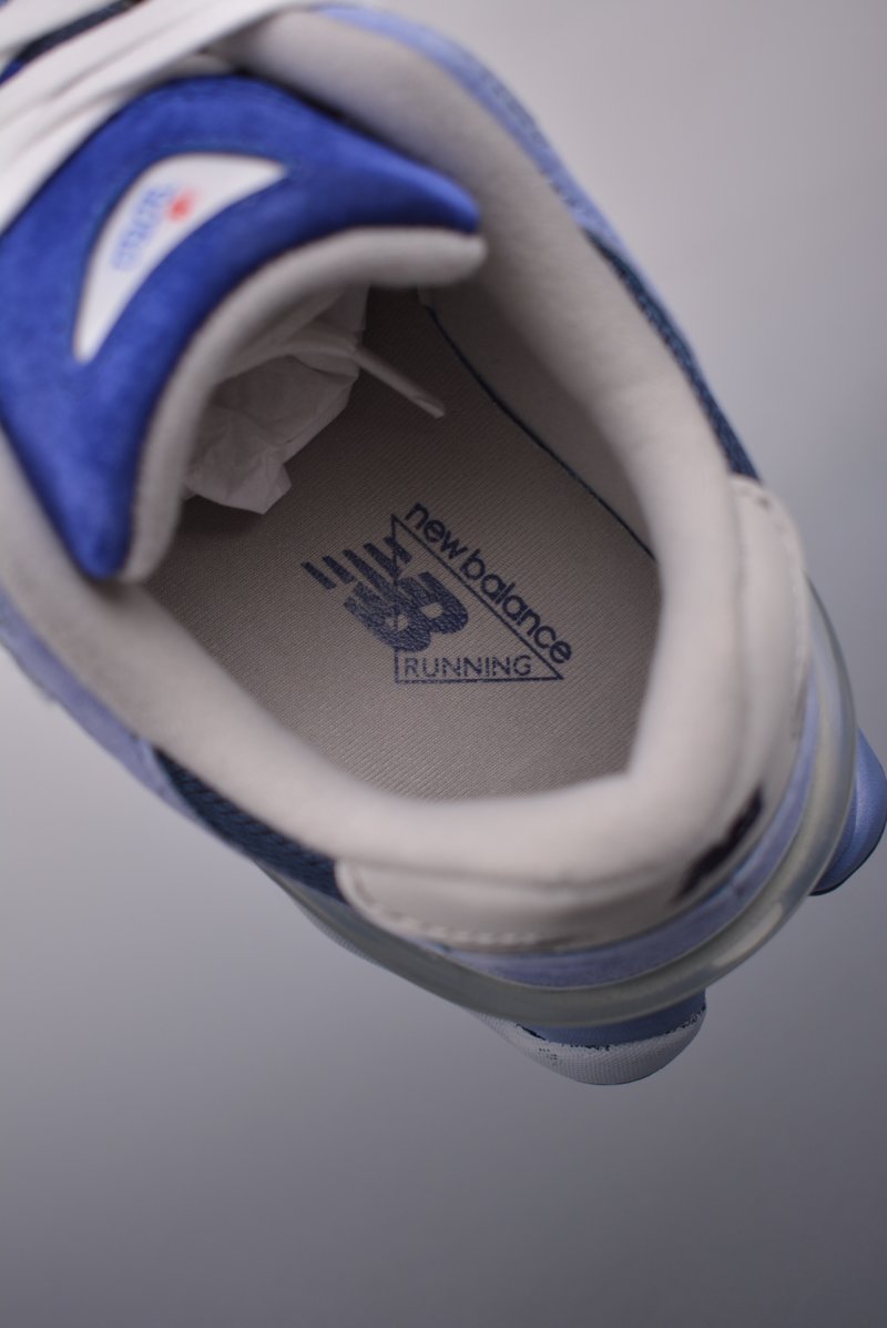 Joe Freshgoods x New Balance 9060 'Orange / Pink' view