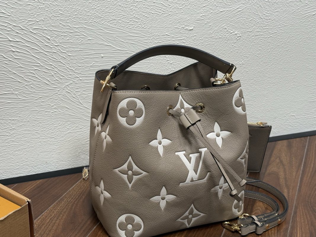 Louis Vuitton Neooe MM Monogram Embossed Bucket Bag Beige view