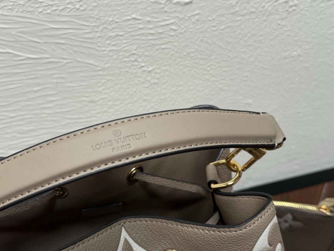 Louis Vuitton Neooe MM Monogram Embossed Bucket Bag Beige view