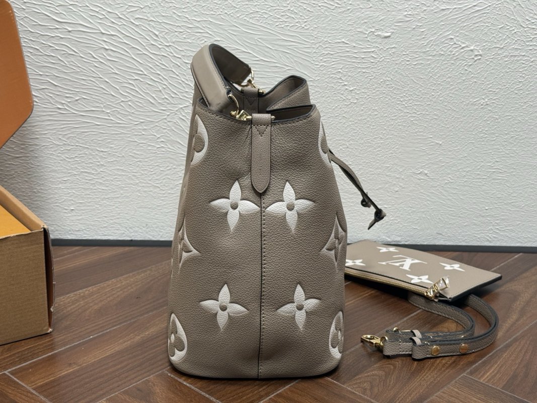 Louis Vuitton Neooe MM Monogram Embossed Bucket Bag Beige view