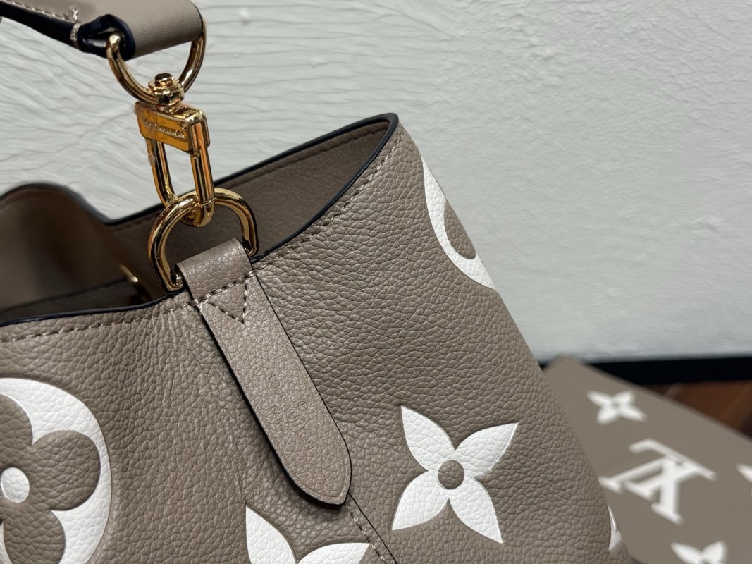 Louis Vuitton Neooe MM Monogram Embossed Bucket Bag Beige view