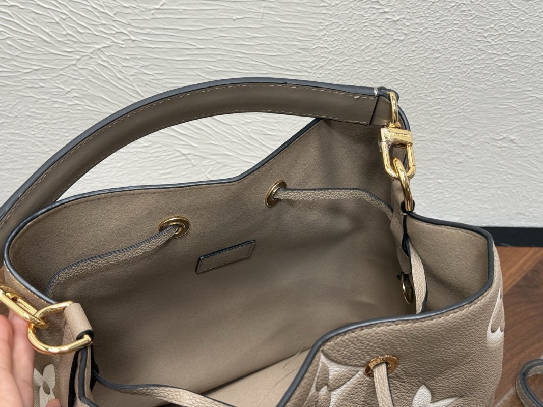 Louis Vuitton Neooe MM Monogram Embossed Bucket Bag Beige view