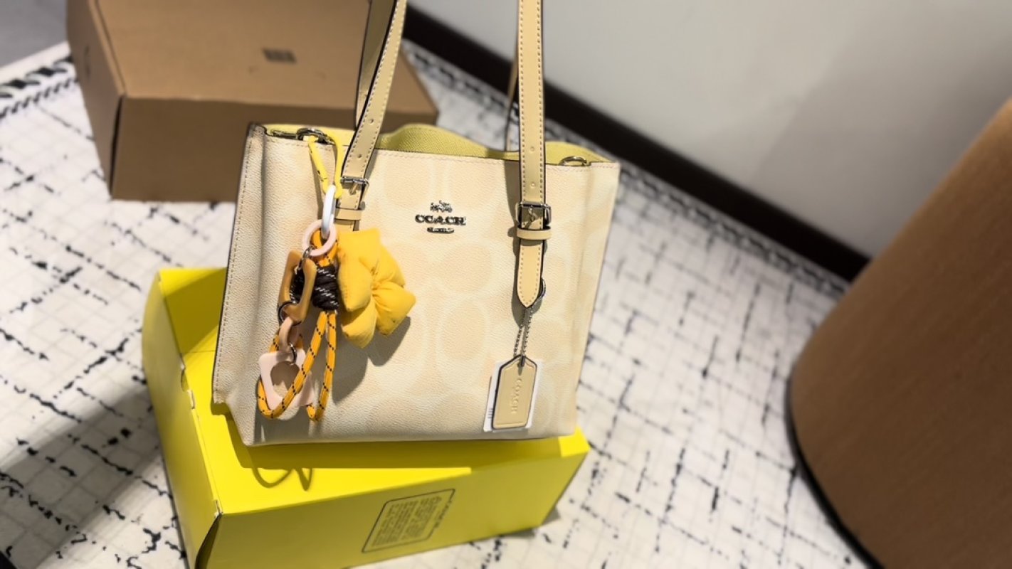 Coach Cream Leather Tote Bag with Yellow Charm