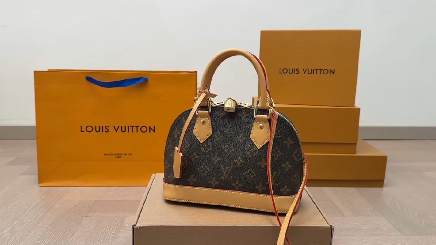 Louis Vuitton Alma Monogram Canvas Handbag Brown
