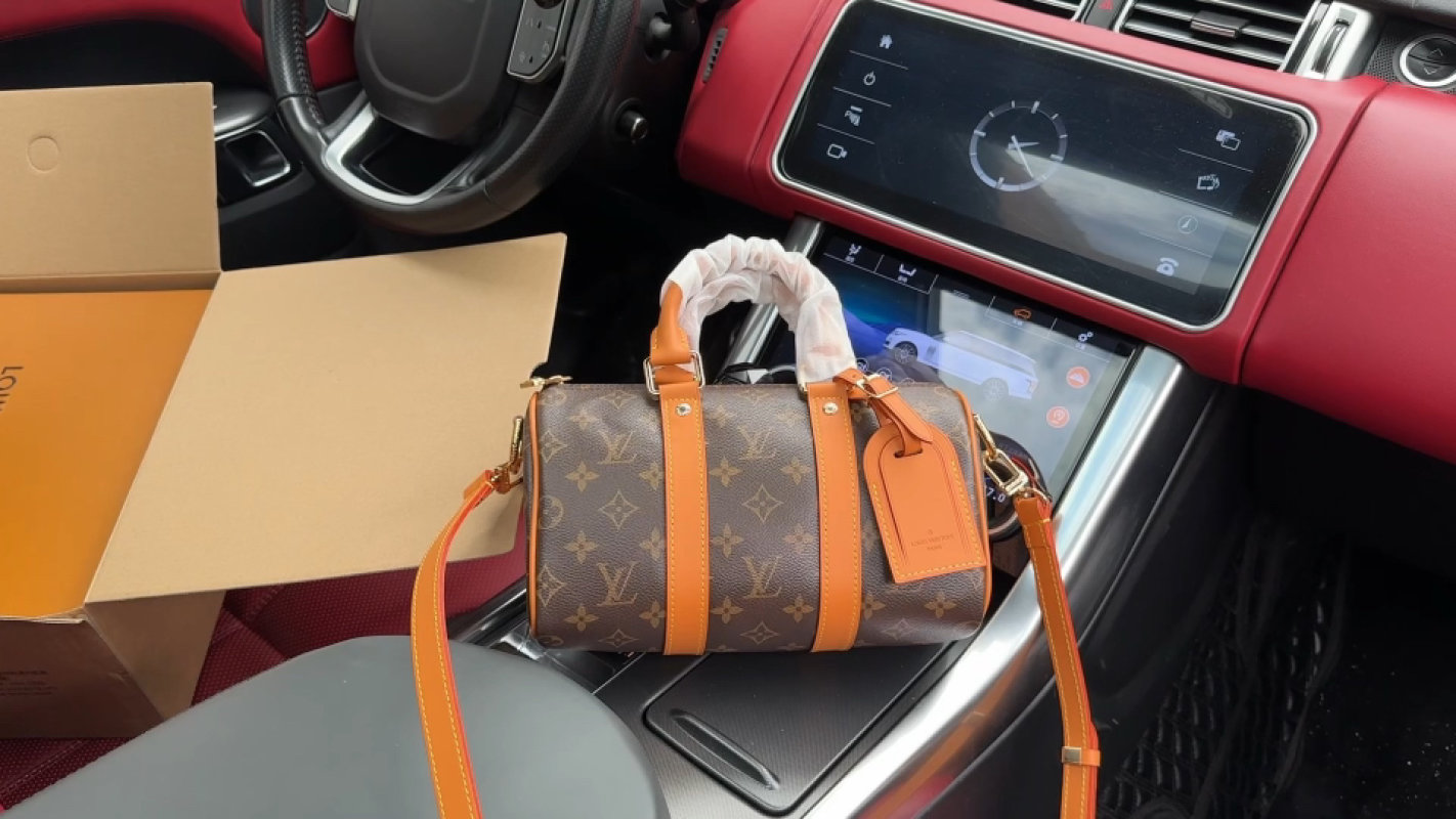 Louis Vuitton Monogram Keepall Bandoulière Orange Tan