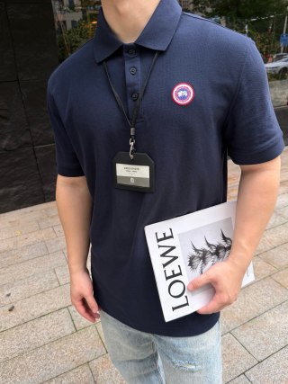 Canada Goose Navy Polo Shirt with Embroidered Badge view 1