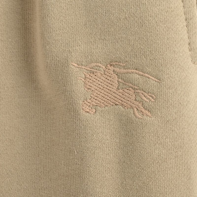 Beige Embroidered Jogger Pants with Crest Detail view