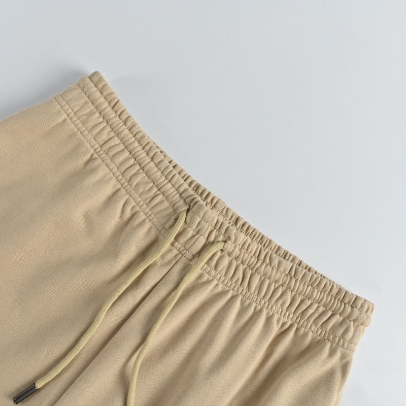 Beige Embroidered Jogger Pants with Crest Detail view