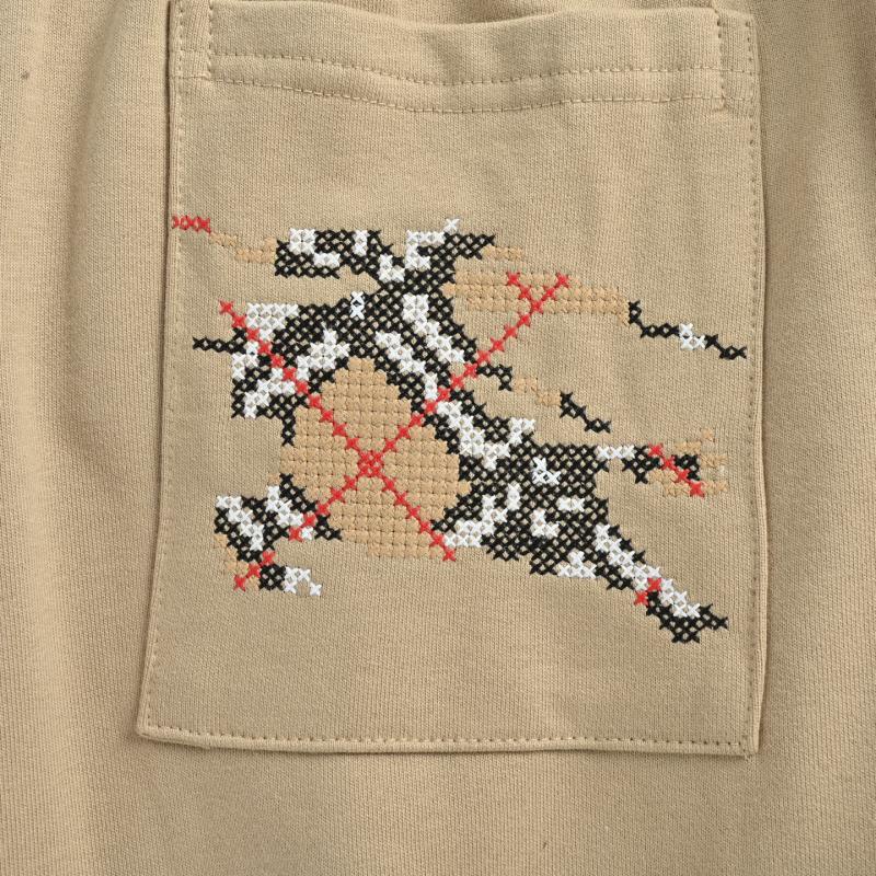 Beige Embroidered Jogger Pants with Crest Detail view