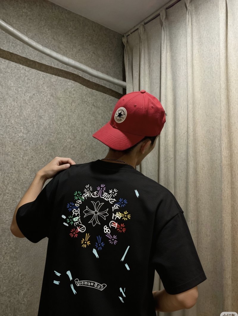 Essentials Black Graphic T-Shirt with Colorful Floral Design view