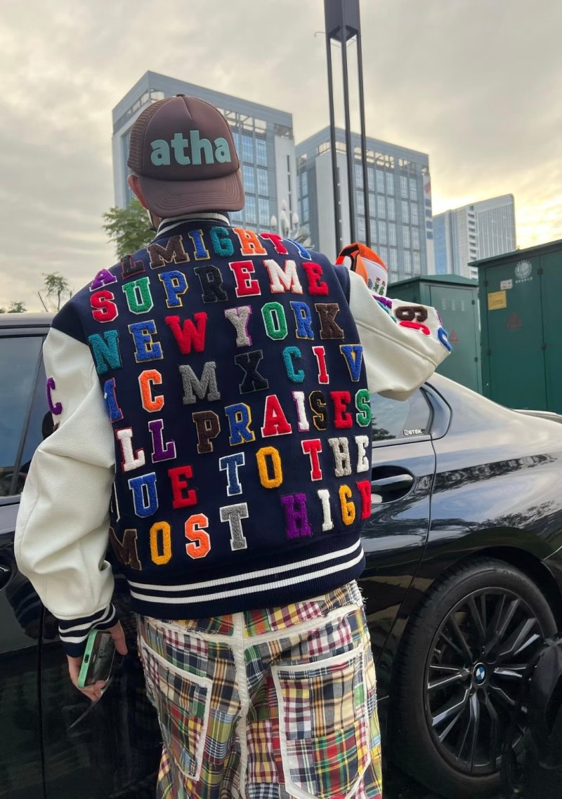 Navy & Cream Varsity Bomber Jacket with Colorful Embroidered Sleeves view