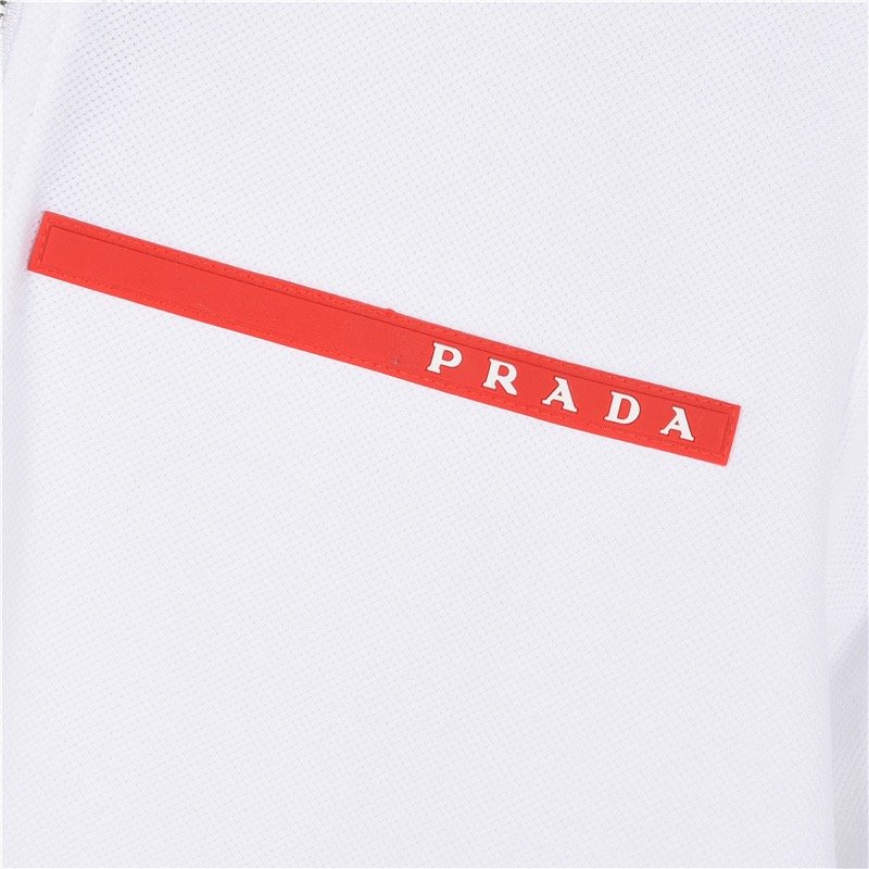 White Short Sleeve Polo Shirt with Red Stripe Detail view