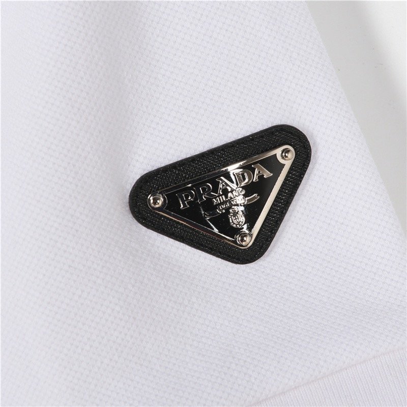 White Short Sleeve Polo Shirt with Red Stripe Detail view