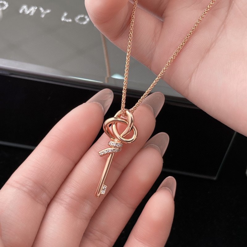 Rose Gold Woven Key Pendant Necklace with Crystal Accents