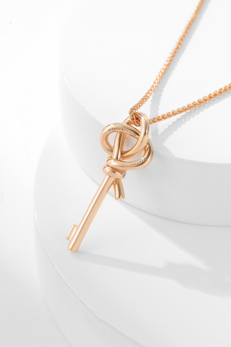 Rose Gold Woven Key Pendant Necklace with Crystal Accents view