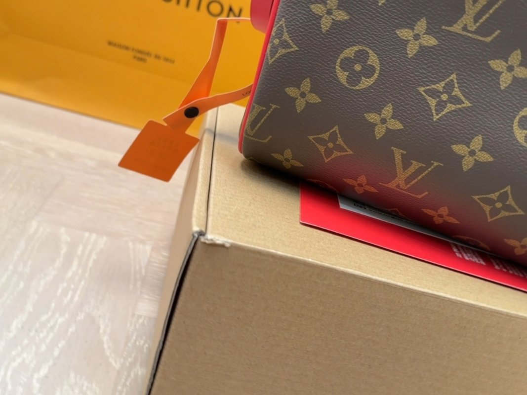 Louis Vuitton Monogram Canvas Bag with Red Leather Trim
