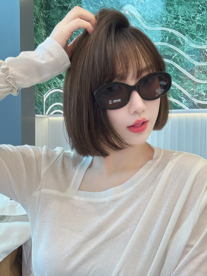 Miu Miu SMU 109Z Black Oval Sunglasses