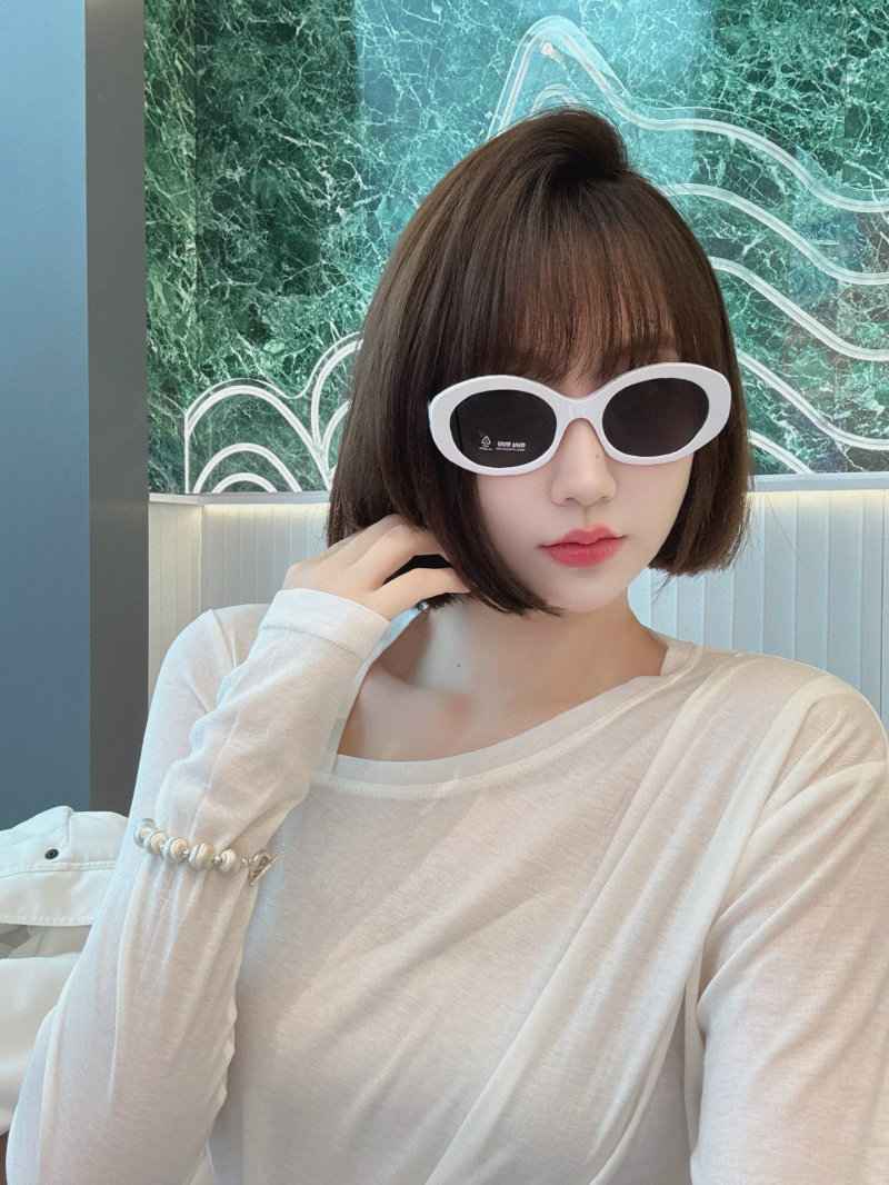 Miu Miu SMU 109Z Black Oval Sunglasses view