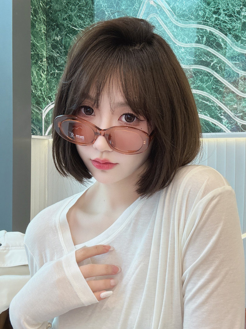 Miu Miu SMU 109Z Black Oval Sunglasses view