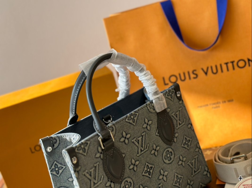 Louis Vuitton On The Go Medium Monogram Empreinte Bag Grey view