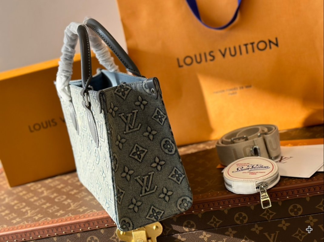 Louis Vuitton On The Go Medium Monogram Empreinte Bag Grey view
