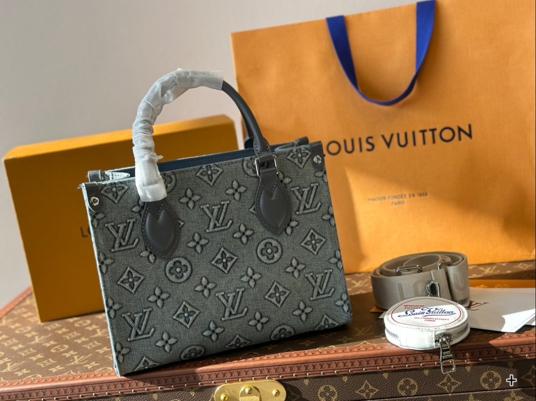 Louis Vuitton On The Go Medium Monogram Empreinte Bag Grey view