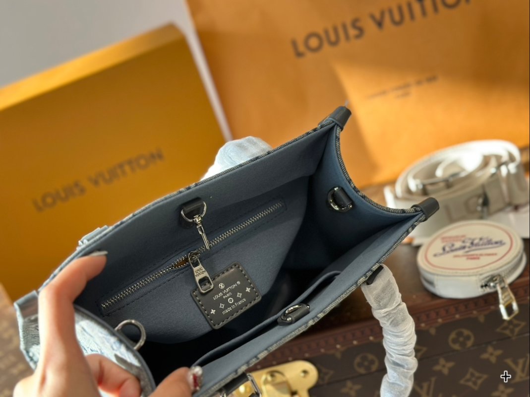 Louis Vuitton On The Go Medium Monogram Empreinte Bag Grey view