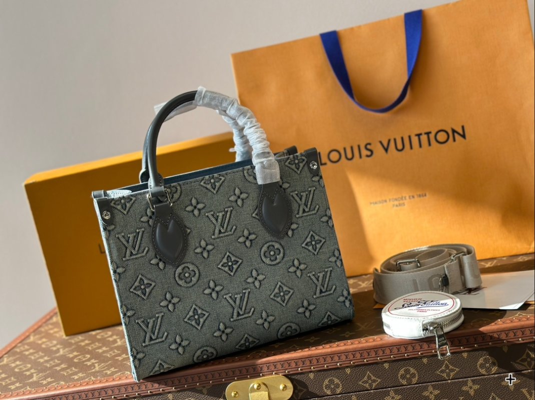 Louis Vuitton On The Go Medium Monogram Empreinte Bag Grey view