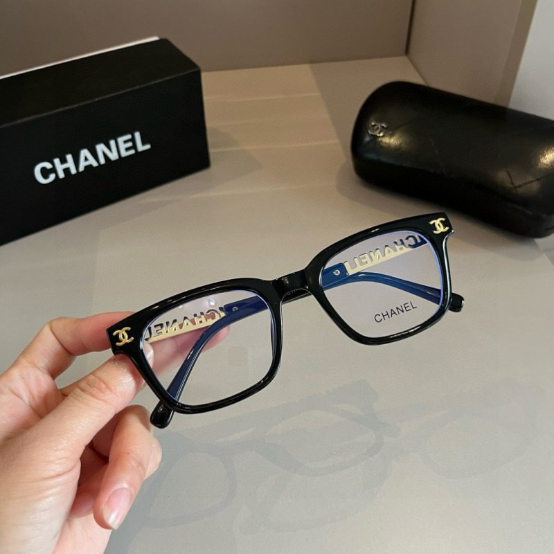 Chanel Black Oversized Frame Sunglasses with Gold Temple Detail view