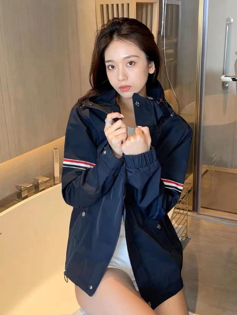 Navy Puffer Jacket with Striped Cuff Detail
