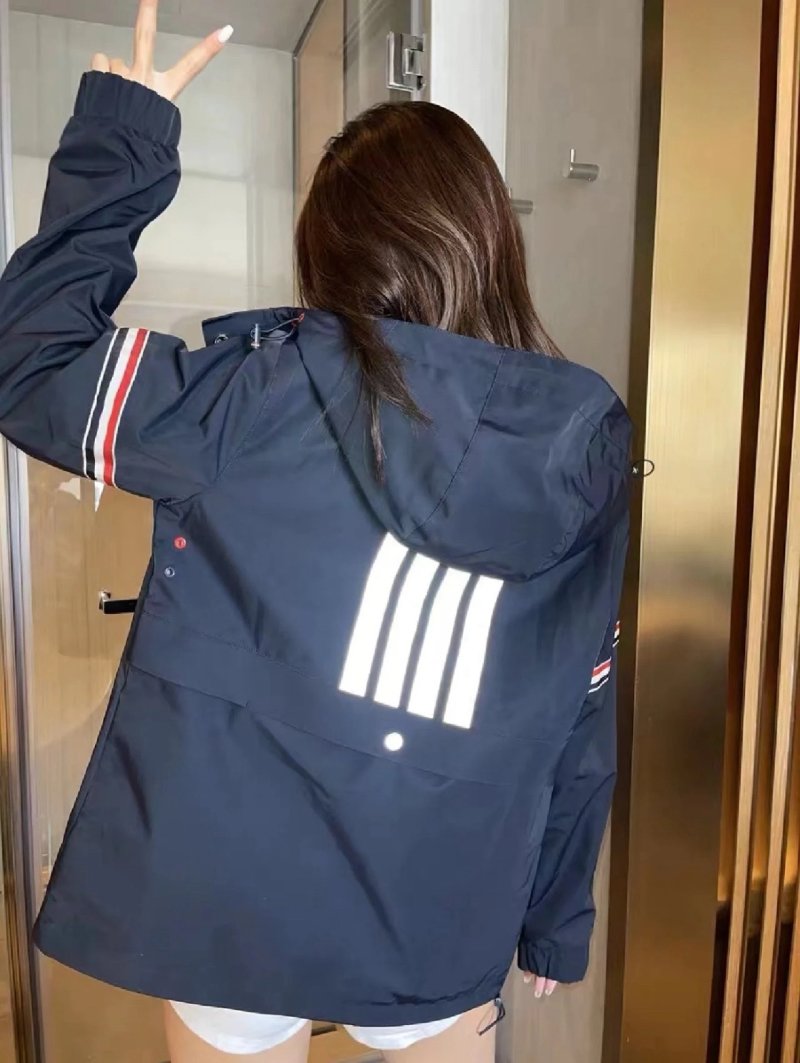 Navy Puffer Jacket with Striped Cuff Detail view