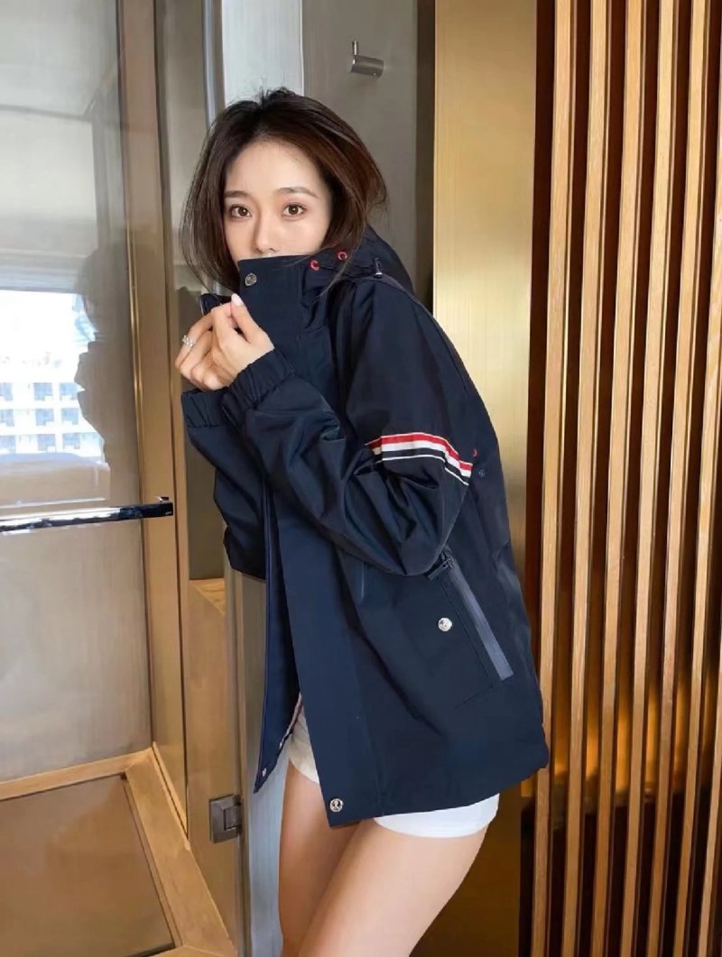 Navy Puffer Jacket with Striped Cuff Detail view