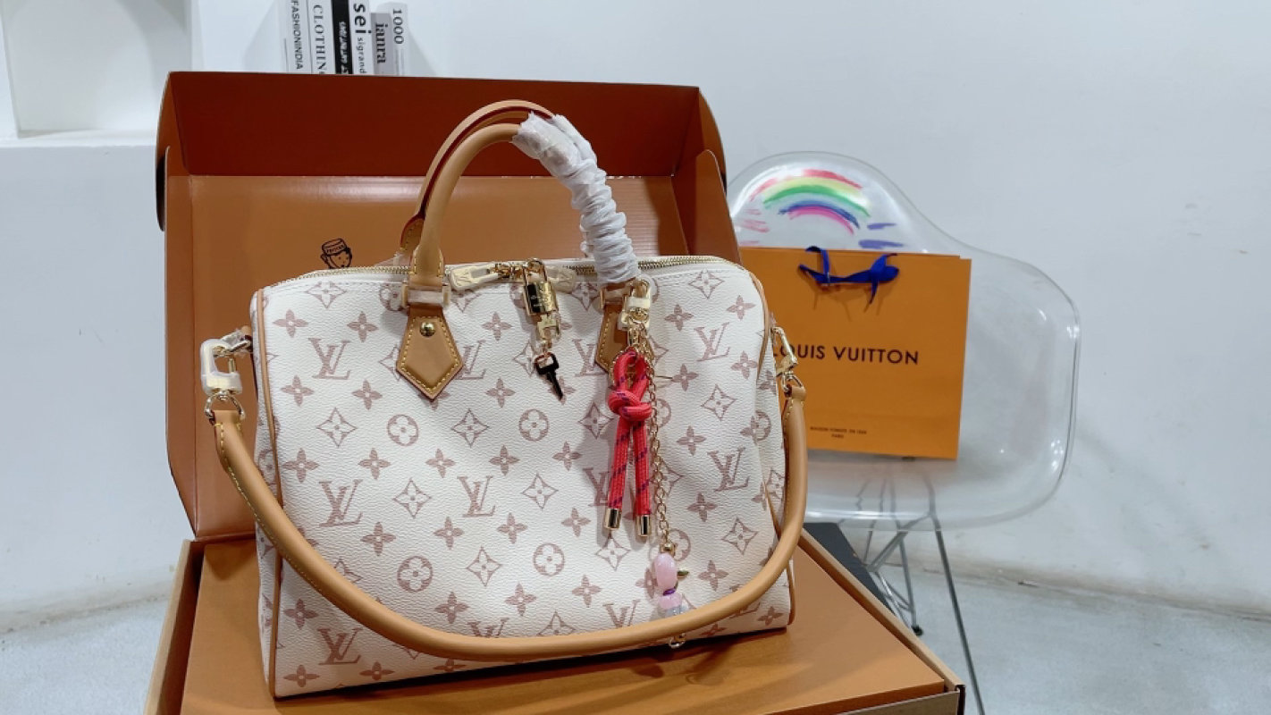 Louis Vuitton Speedy Monogram Canvas Handbag Cream