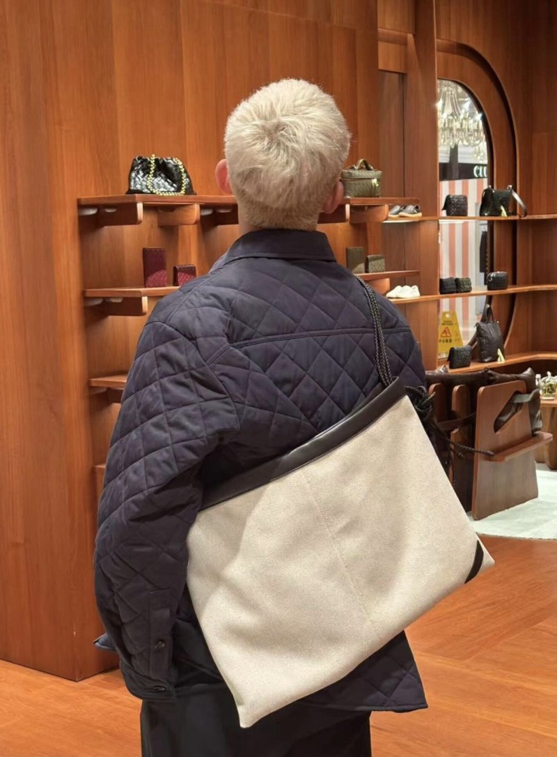 Navy Quilted Puffer Jacket with Leather Trim view