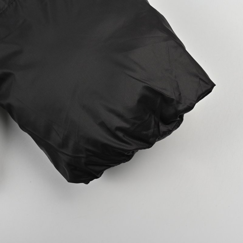 Stüssy Black Puffer Jacket with Pink Hood Lining view