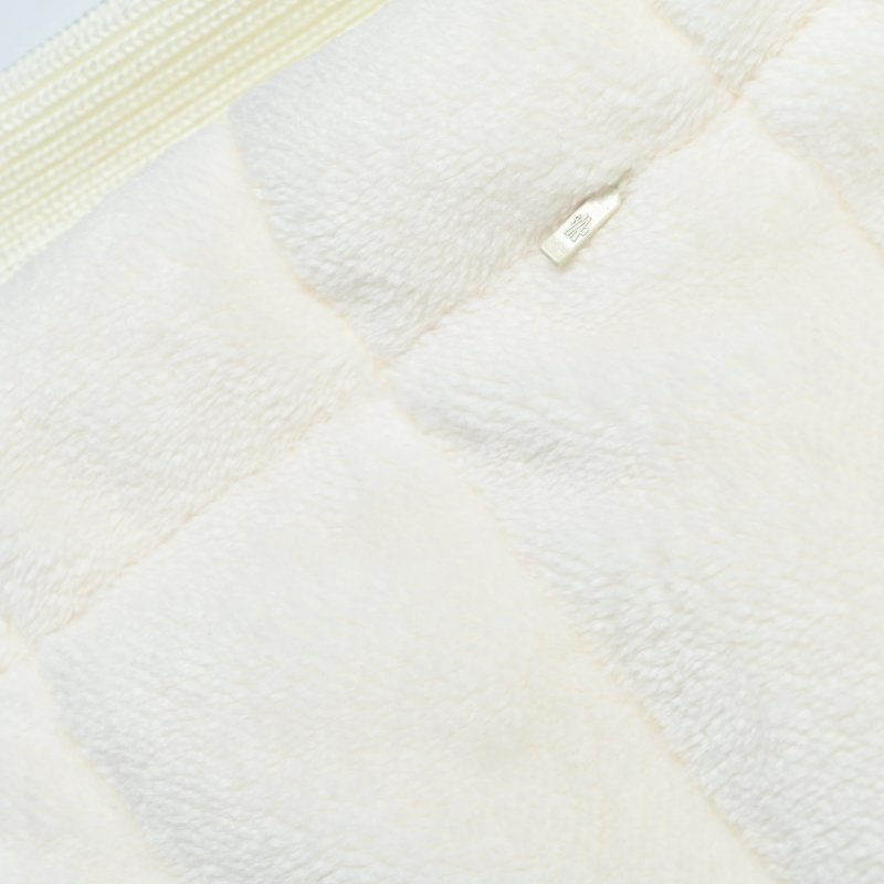 Cream Puffer Vest with Ribbed Knit Sleeves view
