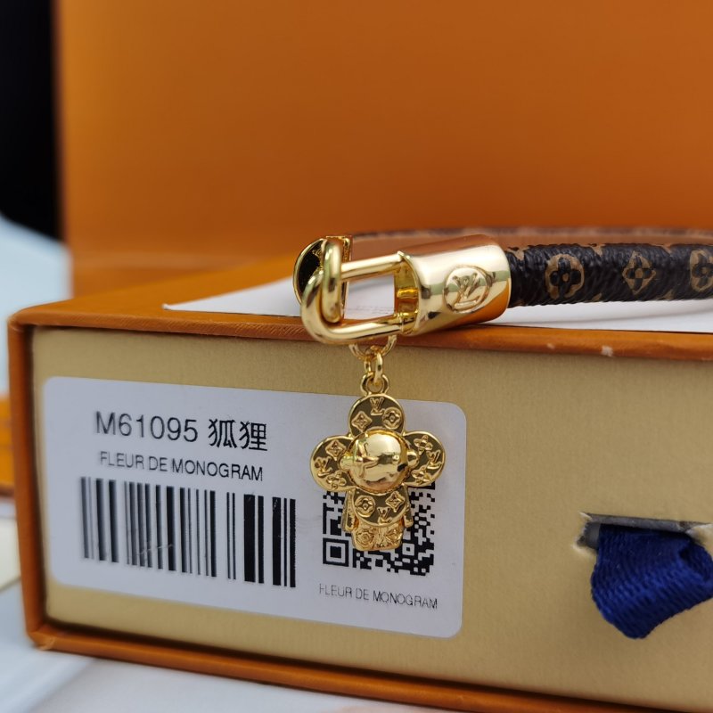Louis Vuitton Monogram Canvas Bracelet with Gold Flower Charm view