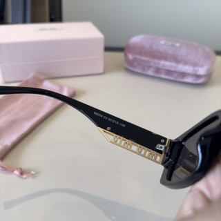 Miu Miu Black Rectangular Sunglasses with Gold Logo view 6