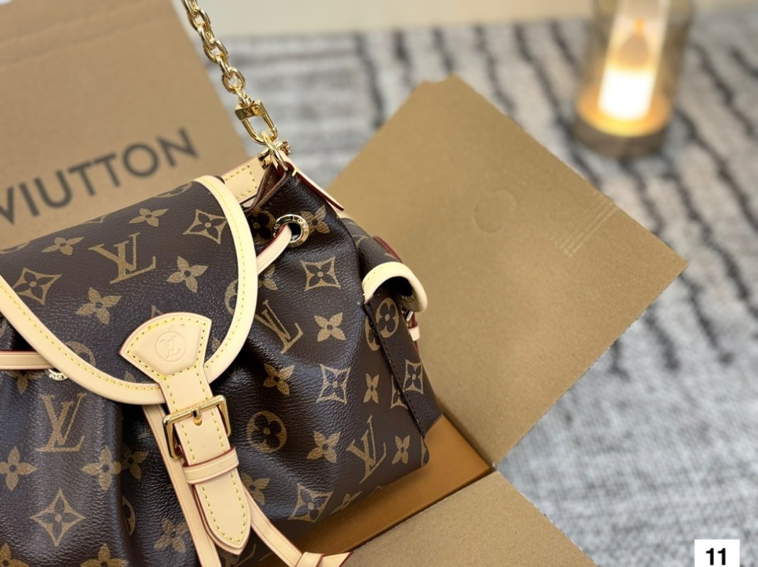 Louis Vuitton Odyssée Monogram Backpack Brown view