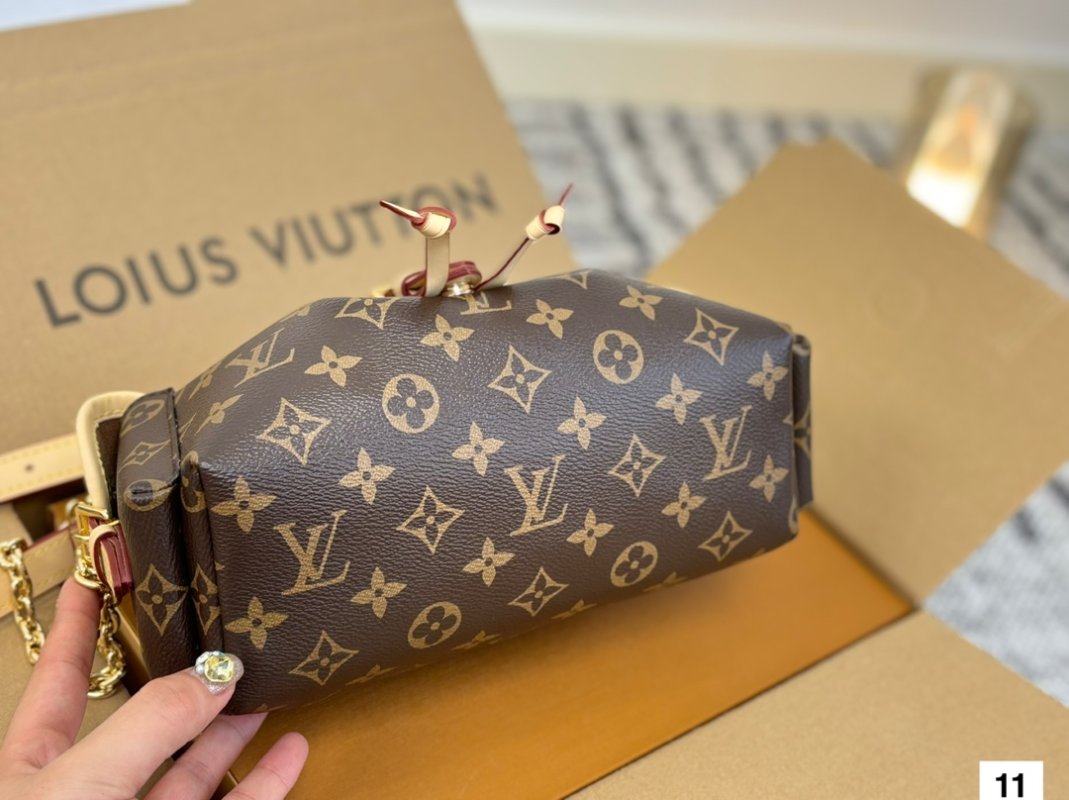 Louis Vuitton Odyssée Monogram Backpack Brown view
